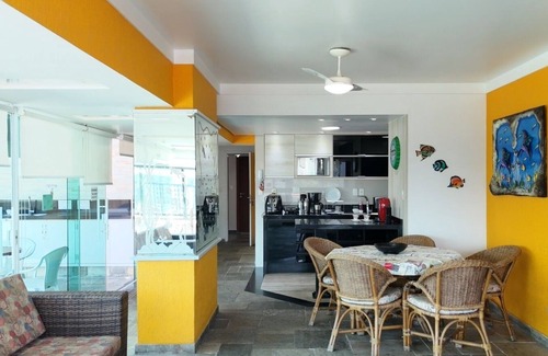 Guaiuba Apartment | Praia do Tombo Guarujá Coverage - Right on the sand, the best comfort for your family