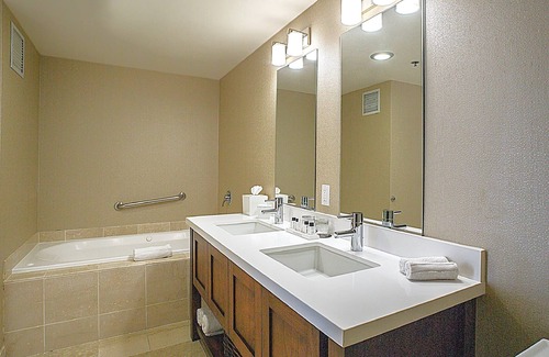 Sunnyvale West Hotel | Premier Fireplace Suite King at The Grand Hotel, Onsite Pool, Free Parking