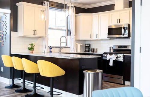 Weinland Park House | Pristine Mid Cen Mod Home I Game Room I Hot Tub on Terrace with City Views