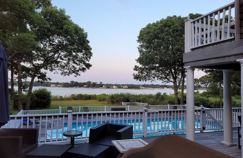 Mastic House | Private, 3-acre, waterfront escape w/pool, firepit, game rm & spectacular views