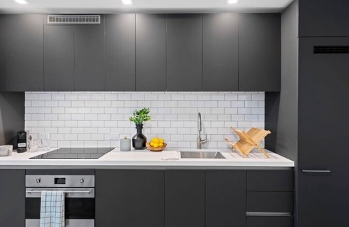 Downtown Miami Condo | Private balcony with panoramic views of Downtown Miami and Biscayne Bay.