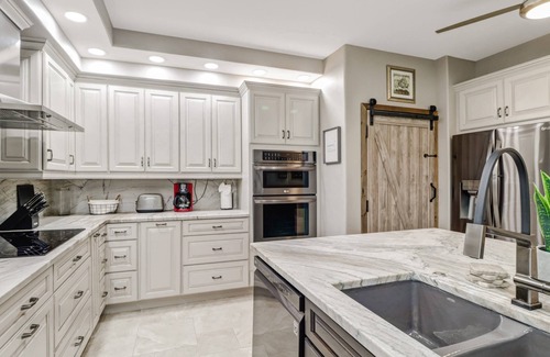 Fort Myers Condo | Private Ground Floor End Unit! Gorgeous Remodel! Lively Colonial Country Club Social Lifestyle!