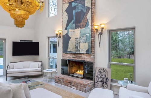 Wainscott Woods House | Private Hamptons vacation home, set on an acre of land, entertainer’s...