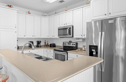 Crystal Shores House | Private home in prestigious Crystal Beach. Steps to beach and Pool!