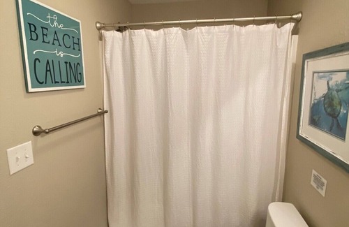 Kill Devil Hills Apartment | PRIVATE King Suite, POOL, GRILL,outdoor shower,coffee bar,mini fridge,microwave