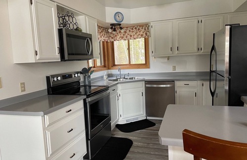 Rhinelander House | Private Lake House with 2200 feet of Frontage on 70 acres