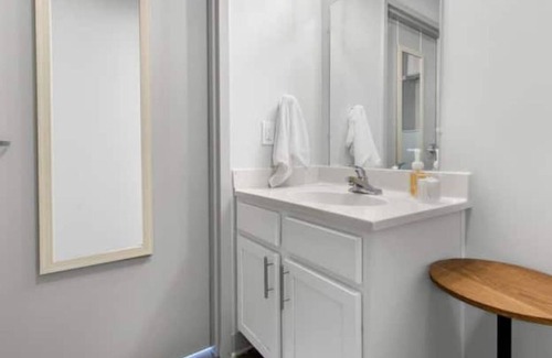 Central City Apartment | Private loft with rooftop deck, fitness center, and private parking.