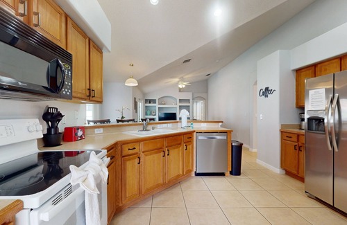 Orange Tree House | Private pool home with attached spa, screened lanai, & on-site tennis/pickleball