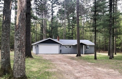 Higgins Lake Cabin | Private wooded cabin on one+ acre less than 1 mile from beautiful Higgins Lake.