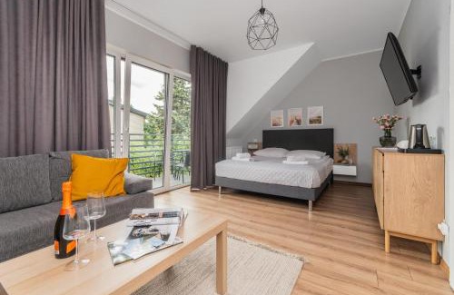 Jantar House | Przystanek Jantar - pokoje i apartamenty