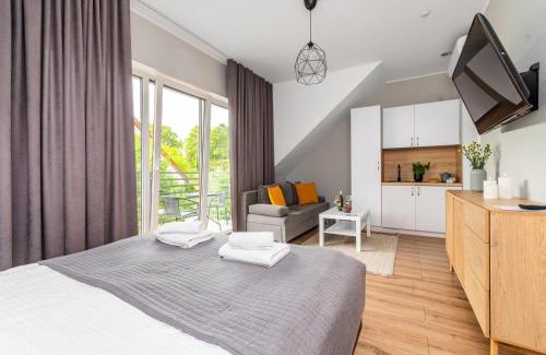 Jantar House | Przystanek Jantar - pokoje i apartamenty