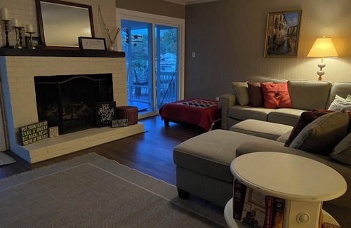 Olivia House | Put your feet up, relax and unwind on the screened porch or go jump in the lake!