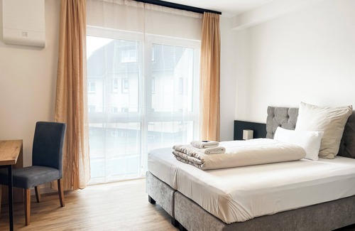 Detmold Hotel | Qonroom - Detmold - Shared kitchen - Grill - App1