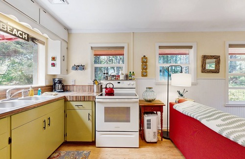 Tillicum Beach Cottage | Quaint cottage in the woods 75 yards to the beach - dog-friendly, firepit & WiFi