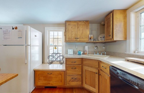 Ludlow House | Quaint lakefront home with a fire pit and beautiful views