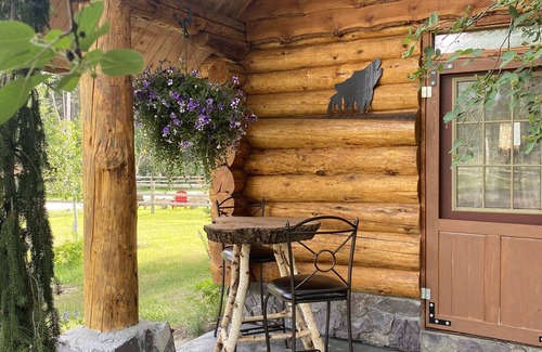 Coram Cabin | Quaint Log Cabin with River View. 7 miles to the entrance of West Glacier