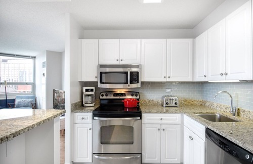 Rush and Division Apartment | Quaint River North 1BR w/Gym + W/D near Mag Mile by Blueground