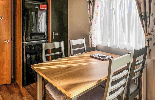 Chester House | Quality 12ft-wide caravan with one double and one twin.
