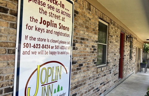 Mount Ida Apartment | Queen Guest Room located at the Joplin Inn on the highway at the entrance to Mountain Harbor, 2 1/2 miles from Lake Ouachita. by RedAwning