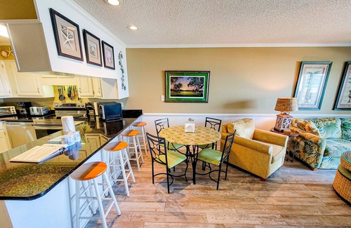 Topsail Beach Condo | Queen's Grant A-102: Beachfront Fun & Ocean Views