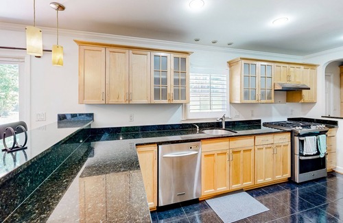 Tucker House | Quiet home in a convenient location with large yard, patio, & fireplace