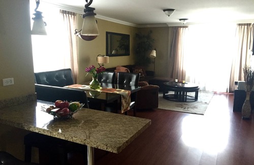 La Mariscal Apartment | Quiet Oasis with Mountain views, near great restaurants, coffee shops nightlife.