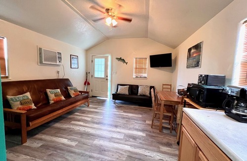 Matagorda Cabin | Quite peaceful cabin resort with pool and BBQ area with firepit!