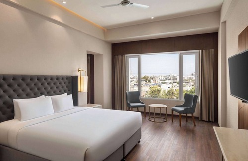 Ahmedabad Hotel | Ramada by Wyndham Ahmedabad Narendra Modi Stadium Motera