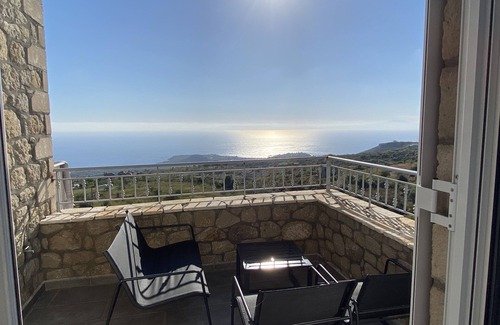 Lefktron House | Rapunzel's tower stone house with incredible 180° sea view 5min drive to the beach