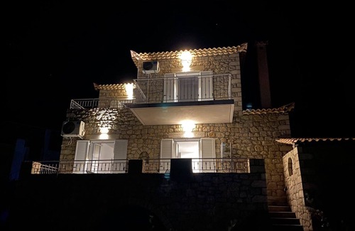 Lefktron House | Rapunzel's tower stone house with incredible 180° sea view 5min drive to the beach
