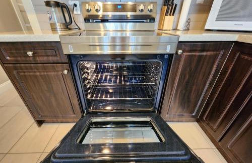 East Side House | Rare Find Exquisitely New Quiet & Safe Skytrain Home