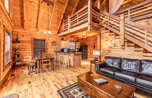 Bryson City Cabin | Real log cabin near Nantahala rafting! Hot tub, easy access, & game room.