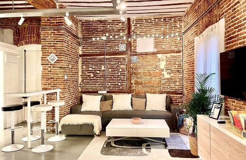 Atocha Apartment | Red brick loft sleeps 6-8 Lavapies Heart