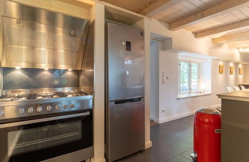 Westerhever Villa | Reetgedecktes Ferienhaus in Westerhever mit Sauna
