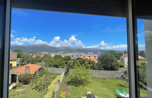 Puebla del Caraminal Condo | Refurbished house 7 minutes walk from the beach, overlooking the Ria de Arousa.