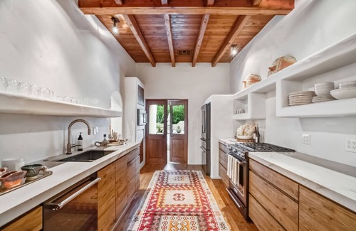 Magnesia Falls Cove House | Rejuvenating retreat with pool, artistic finishes, & mtn views - dog-friendly