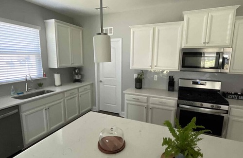 Fuquay-Varina House | Relax and enjoy this beautiful, modern home with a gourmet kitchen!