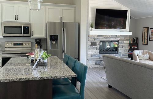 Rapid City House | Relax at our beautiful lakefront home located on the southern end of Torch Lake.