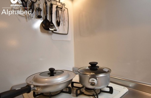 Kita Ward Apartment | Relax in a calm space A room with a kitchen where - Alphabed Okayama Sennichimae 105 /Okayama Okayama