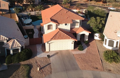 Avondale House | Relax in private heated hot tub or just bask in the sun by the pool.