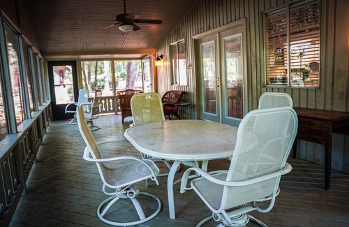 Pine Mountain Ski Chalet | Relax on your screened in porch in this pet friendly chalet!