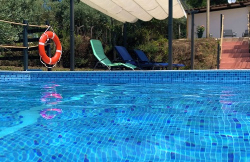 Serta House | Relax, swim and unwind at this Portuguese house 5 minutes from Sertã, Portugal.