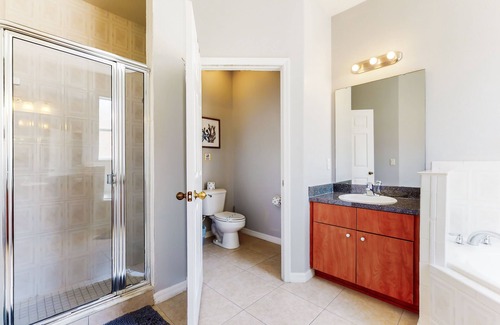 Crystal Cove House | Relaxing Florida getaway with an enclosed pool, grill, game room, & central AC
