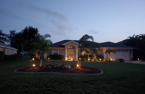 Broadmoor House | Relaxing in Rotonda Poolside. Saltwater heated Pool with new screened lanai.