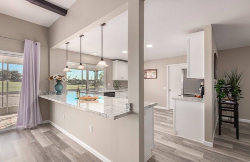 Sun City House | Remodeled designers home with sunrises and sunset views on Palm Brook Golf !