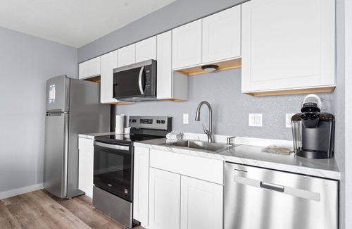 Indian Point Condo | Remodeled Lakefront Condo | Swim-Up Bar, Tiki Bar & Full Marina Access!