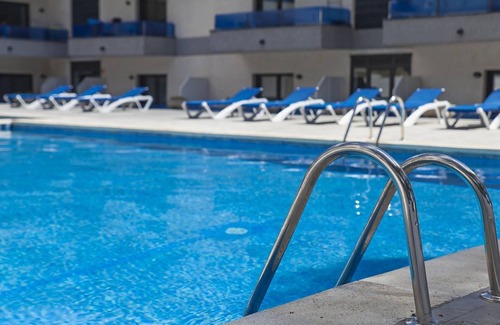 Platja d'Aro Apartment | Renovated Apartment in Tranquil Area, 150m from Beach, Pool, A/C, Free Wi-Fi, Parking Available