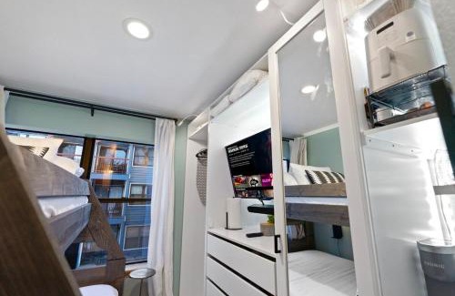 Historic District Apartment | Resort Studio Suite in Prime Breck Location with Free Parking, Hot Tubs, Sauna & Gym