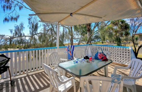 Woodgate House | Retro Esplanade property with Ocean views