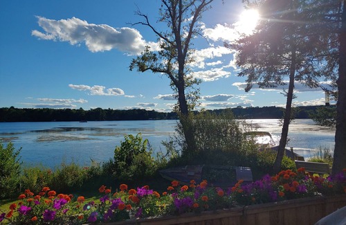 Amery House | Riverfront cabin with kayaks and canoes